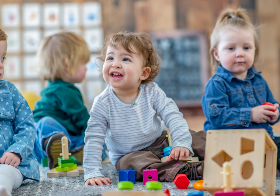 Toddlers playing with toys