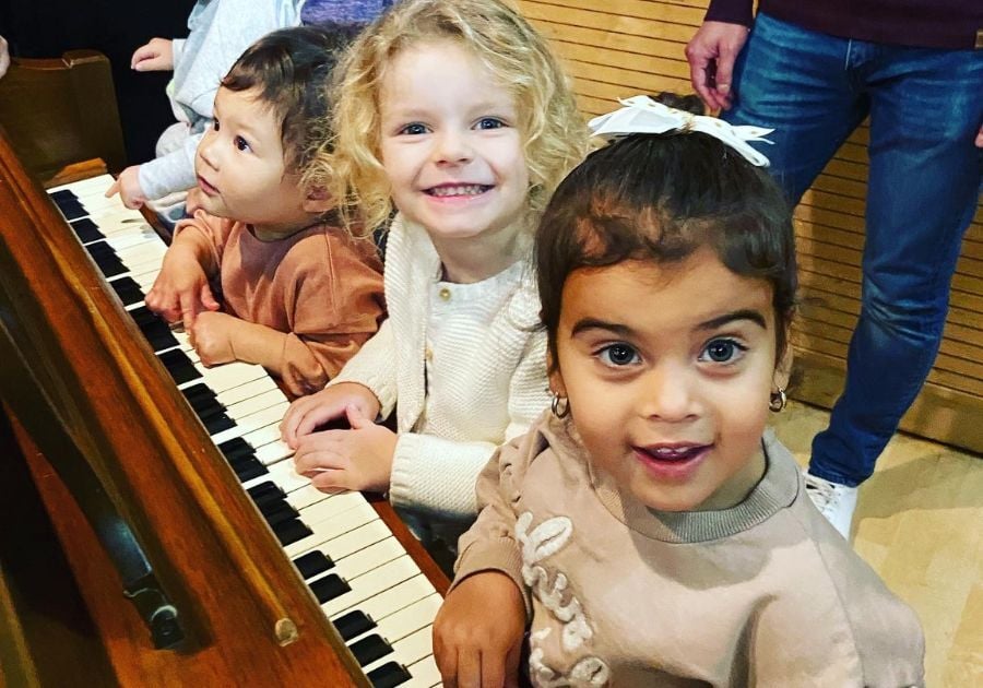 toddlers playing on the piano toddlers playing on the piano
