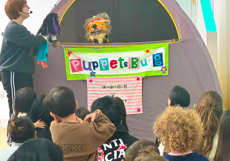 Preschoolers watching a puppet show