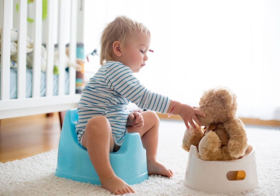 child on a potty